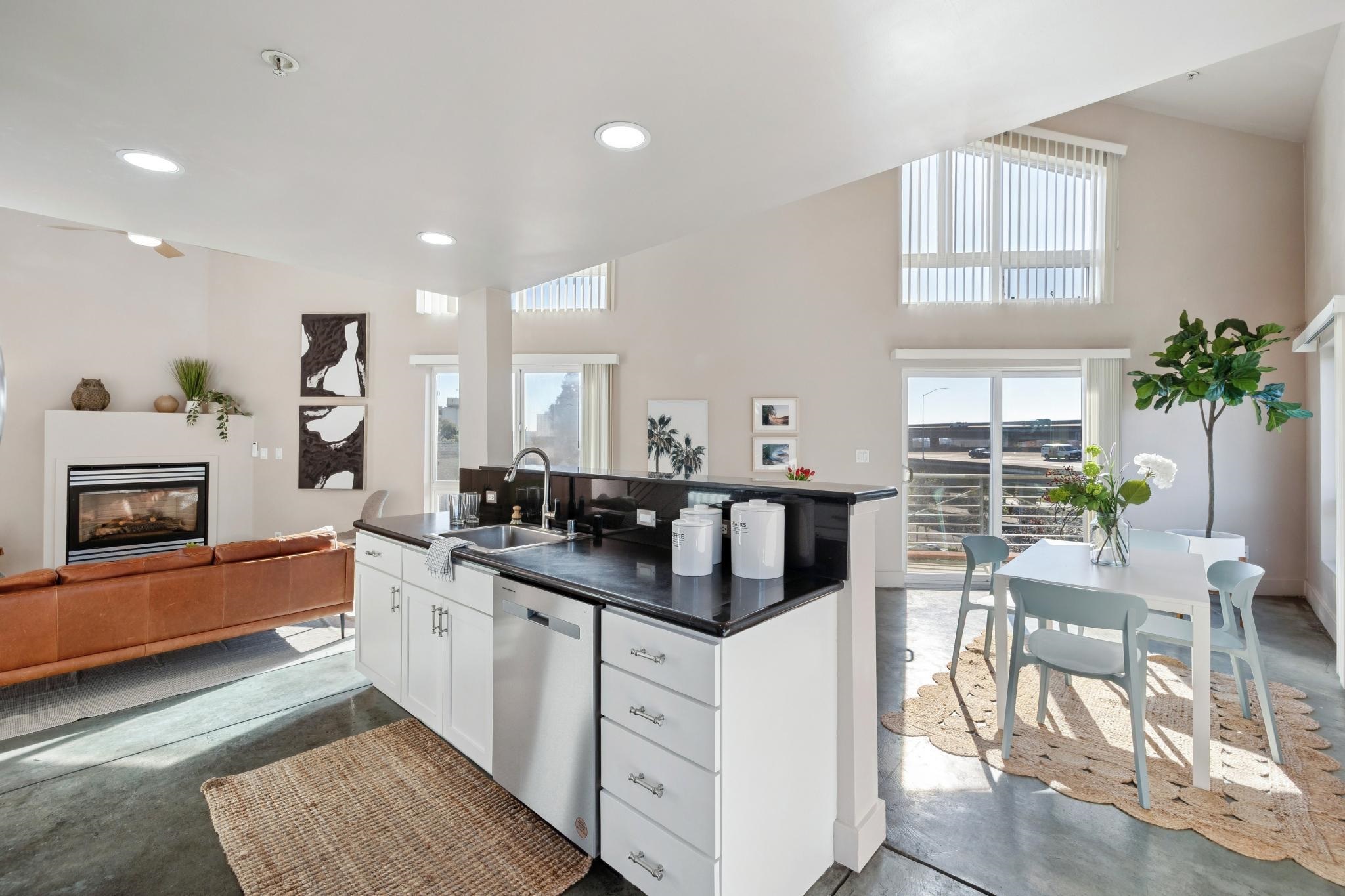 675 8th Street, Unit 10 Oakland, CA 94607 - Photo 17 of 40 a kitchen with counter top space and windows