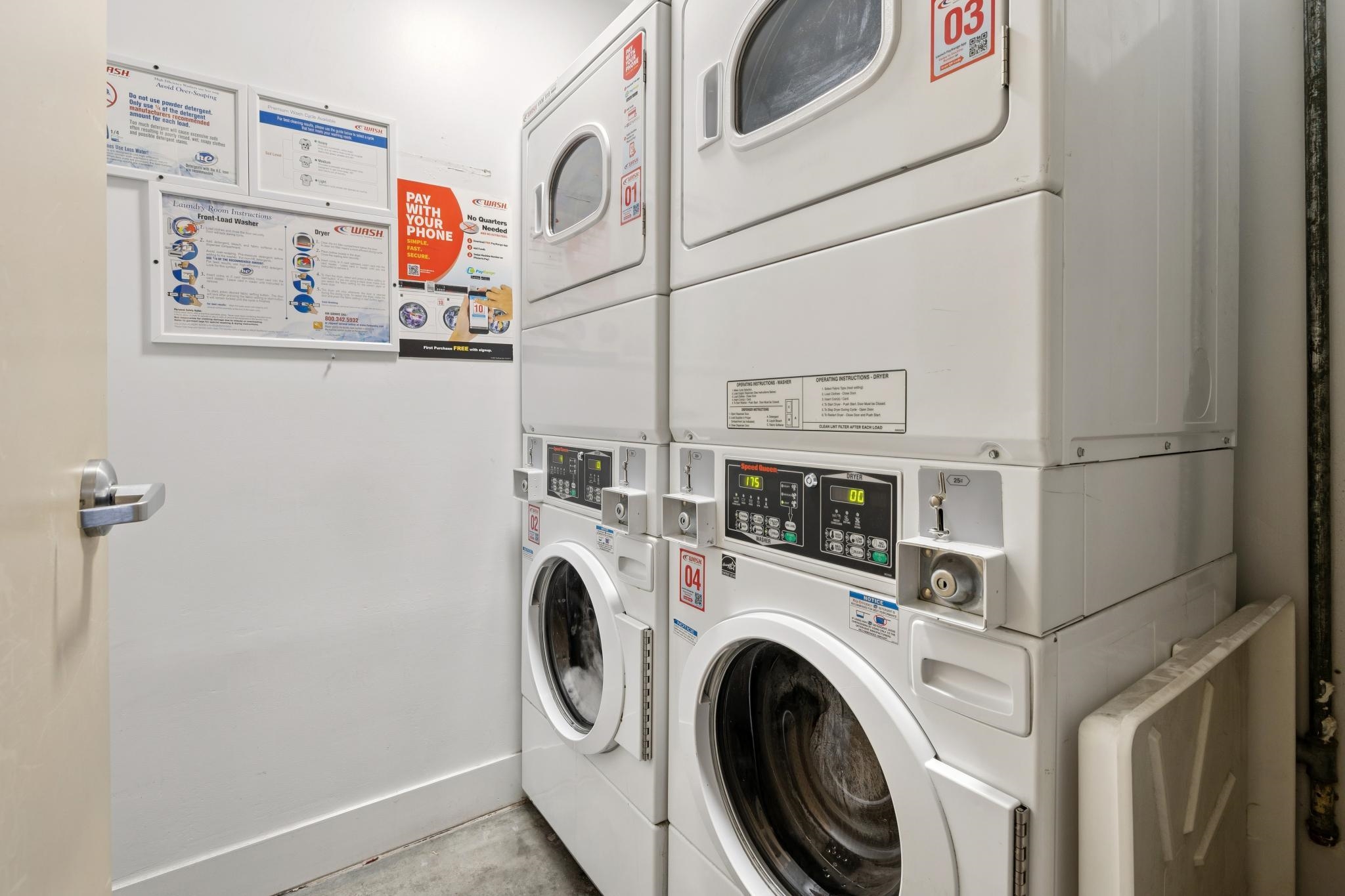 675 8th Street, Unit 10 Oakland, CA 94607 - Photo 31 of 40 a utility room with dryer and washer
