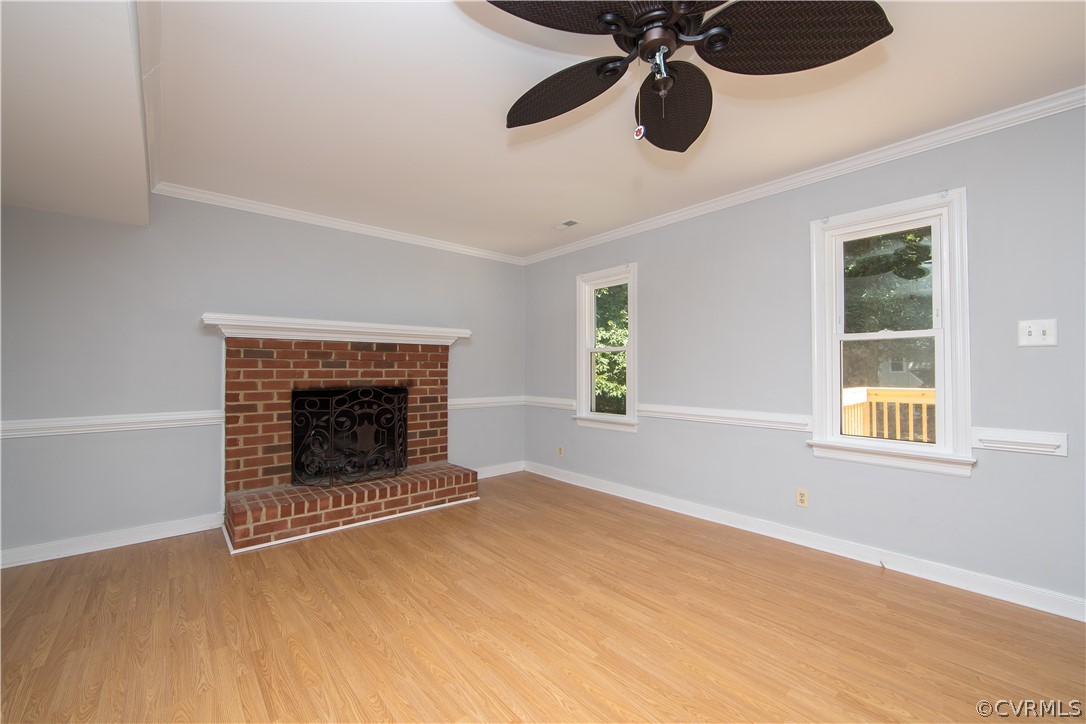 4915 Cedar Cliff Road Chester, VA 23831 - Photo 14 of 35 a view of an empty room with window and chandelier fan