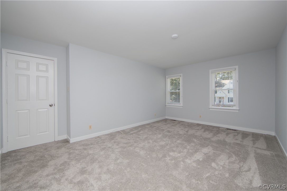4915 Cedar Cliff Road Chester, VA 23831 - Photo 16 of 35 an empty room with windows