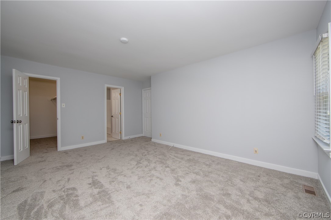 4915 Cedar Cliff Road Chester, VA 23831 - Photo 17 of 35 a view of an empty room and closet area