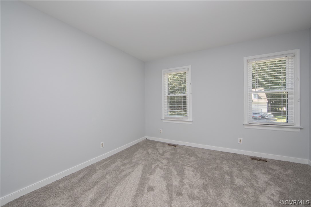 4915 Cedar Cliff Road Chester, VA 23831 - Photo 21 of 35 an empty room with a window
