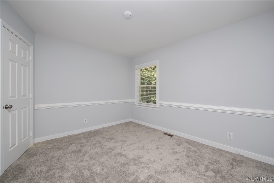 4915 Cedar Cliff Road Chester, VA 23831 - Photo 23 of 35 a view of an empty room with a window