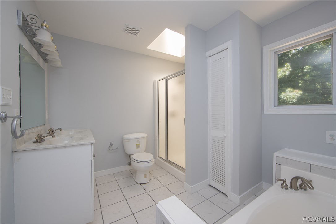 4915 Cedar Cliff Road Chester, VA 23831 - Photo 29 of 35 a bathroom with a sink a toilet and a mirror