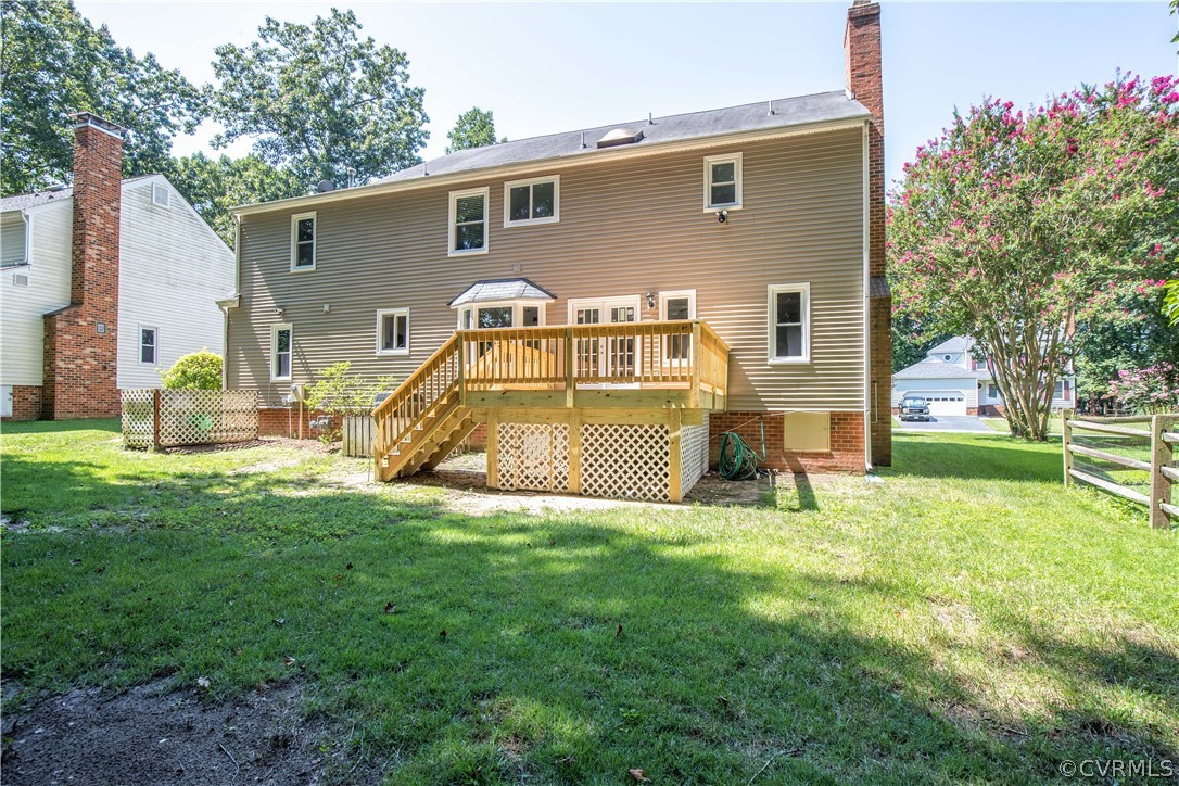 4915 Cedar Cliff Road Chester, VA 23831 - Photo 33 of 35 a view of a house with a backyard
