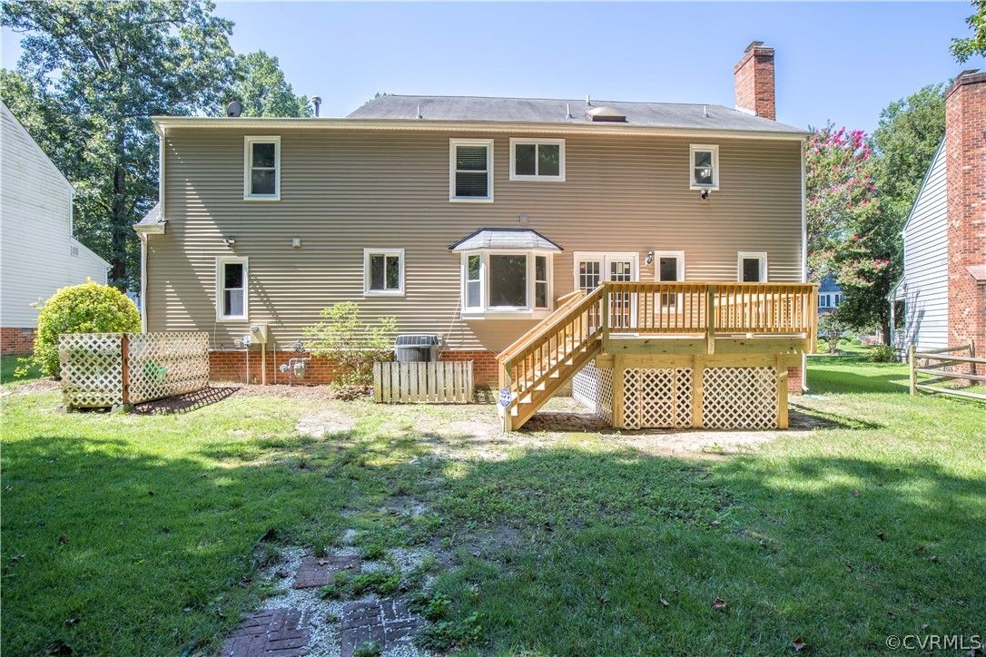 4915 Cedar Cliff Road Chester, VA 23831 - Photo 34 of 35 a view of a house with a yard and a porch