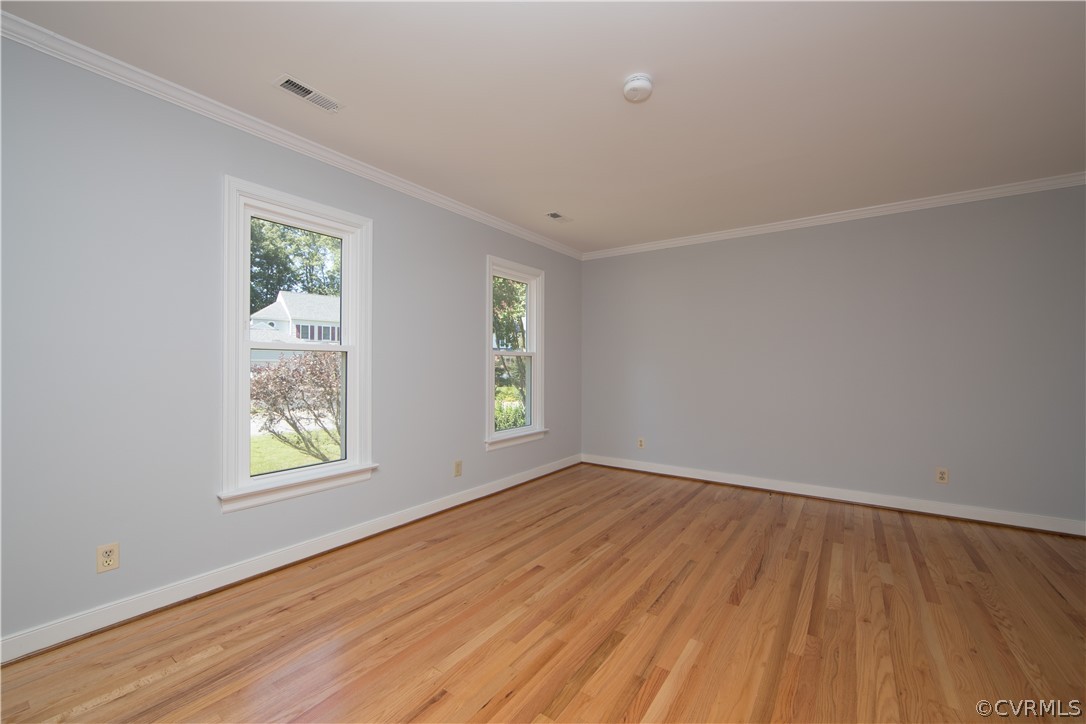 4915 Cedar Cliff Road Chester, VA 23831 - Photo 6 of 35 an empty room with wooden floor and windows