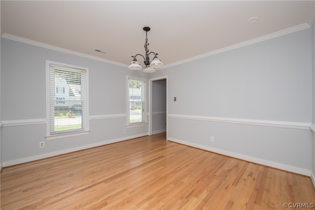 4915 Cedar Cliff Road Chester, VA 23831 - Photo 8 of 35 wooden floor in an empty room with a window