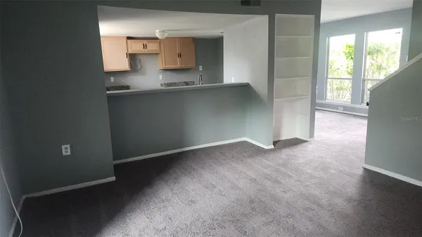 an empty room with windows