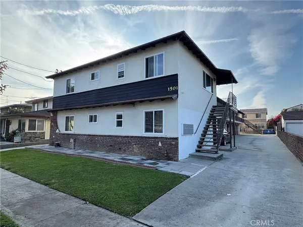 a house view with a garden space