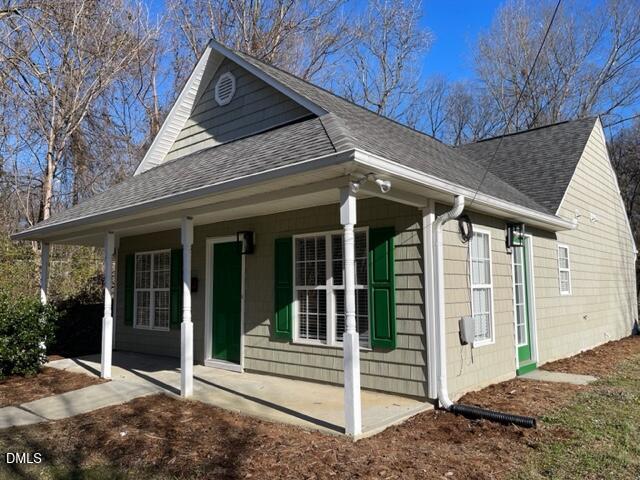 415 Sowell Street Durham, NC 27701 - Photo 3 of 19 a front view of a house with a porch