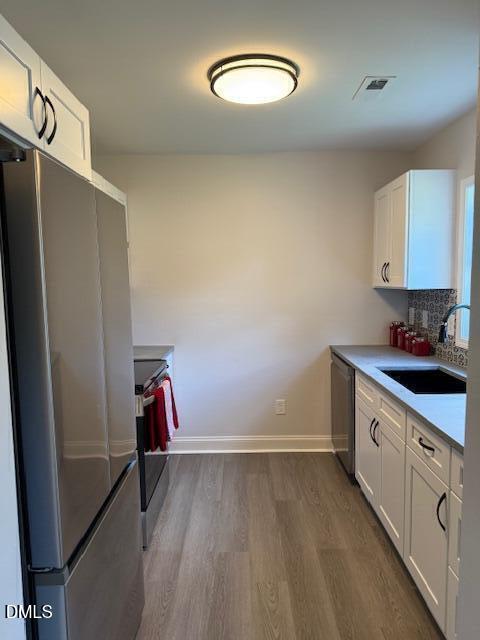 415 Sowell Street Durham, NC 27701 - Photo 9 of 19 a view of a storage & utility room with washer and dryer