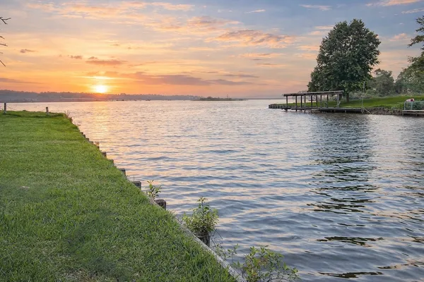 a view of a lake with outdoor space