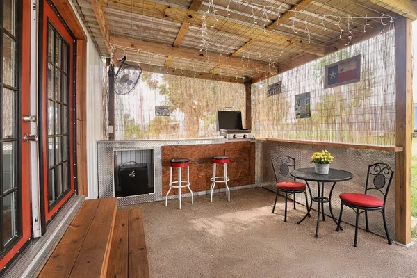 a view of a livingroom with furniture and a fireplace