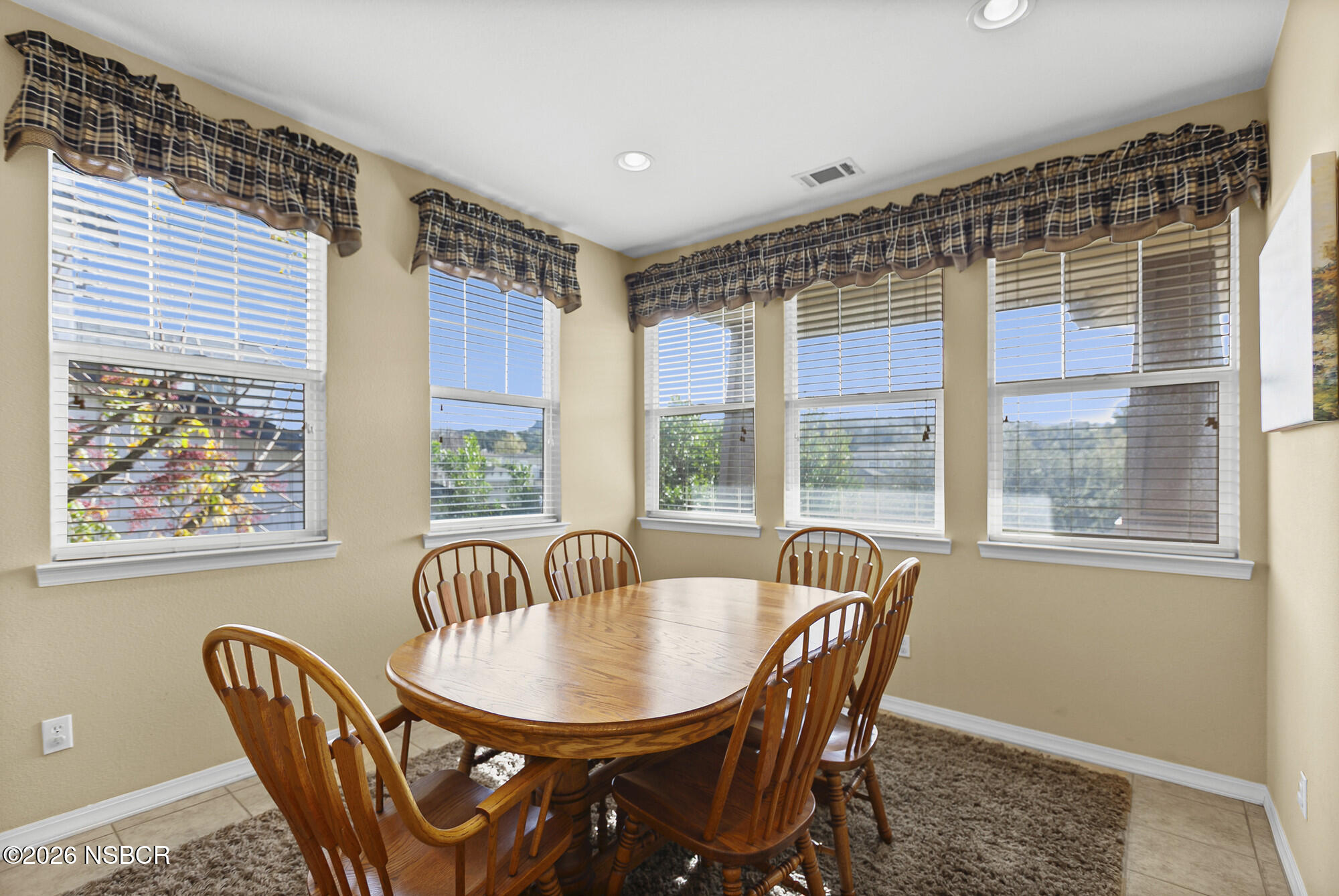 1557 Canyon Creek Road Santa Maria, CA 93455 - Photo 13 of 43 a view of a dining room with furniture window and outside view