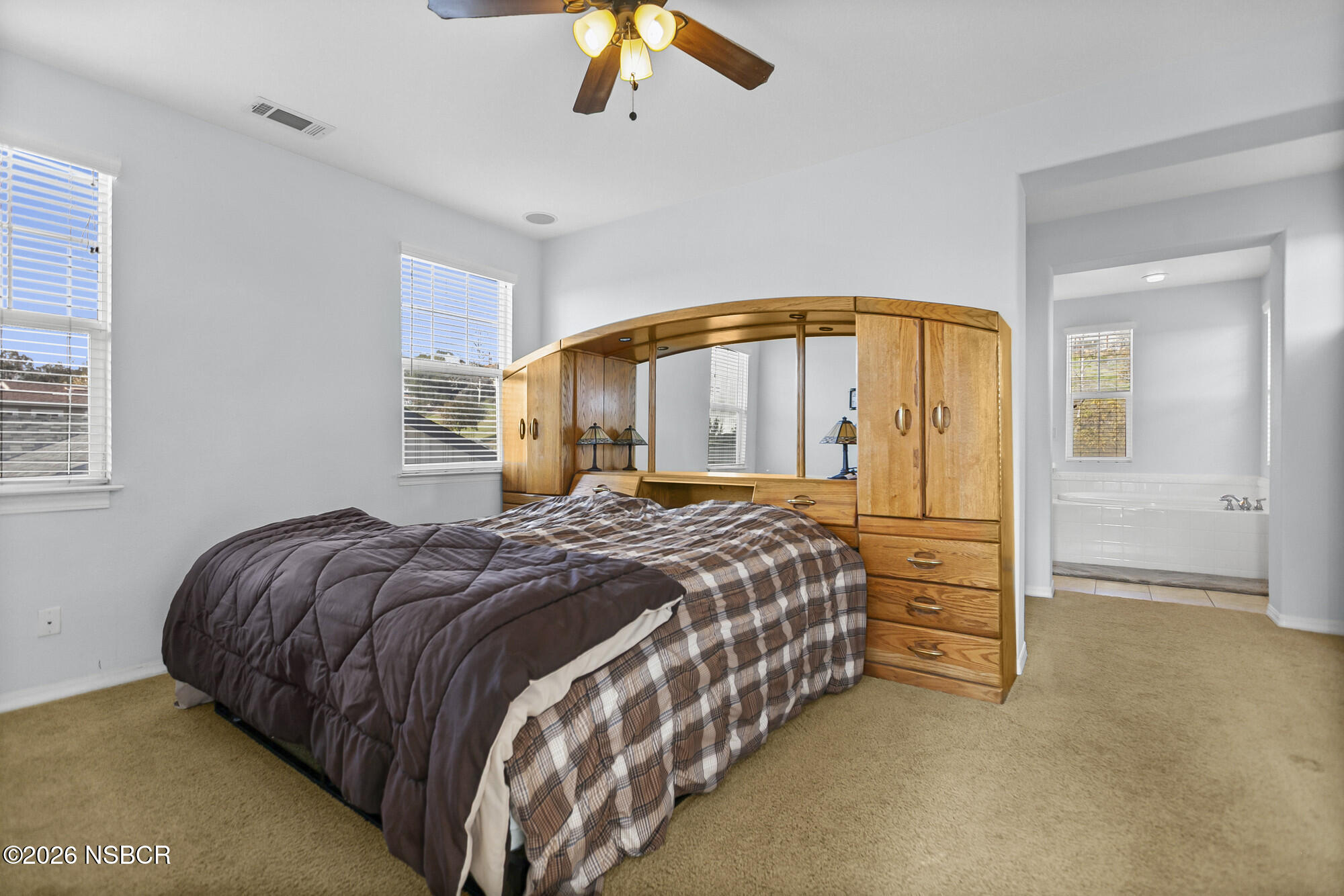 1557 Canyon Creek Road Santa Maria, CA 93455 - Photo 17 of 43 a bedroom with a bed and painting on the wall