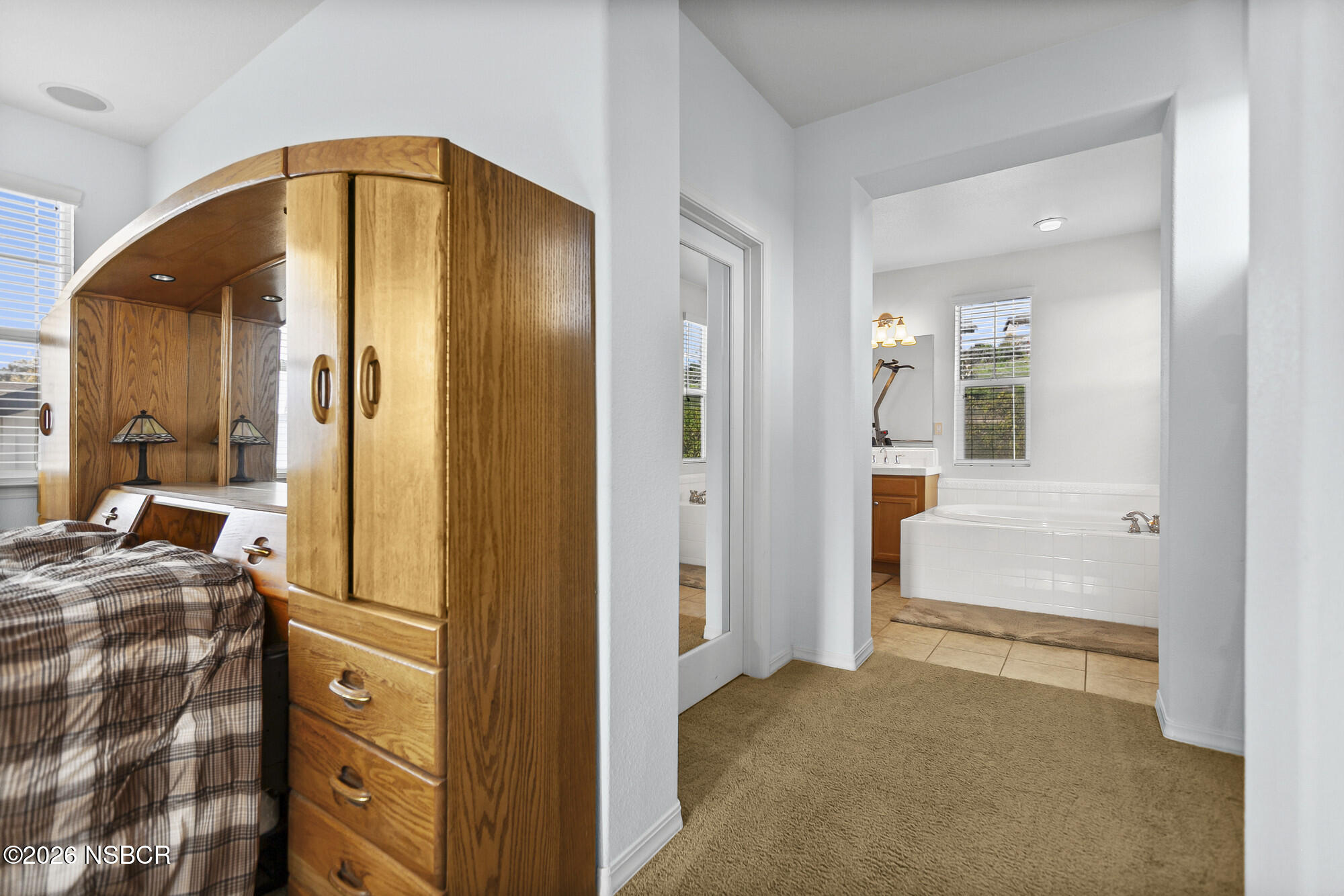 1557 Canyon Creek Road Santa Maria, CA 93455 - Photo 18 of 43 a en suite bathroom with a sink and a mirror