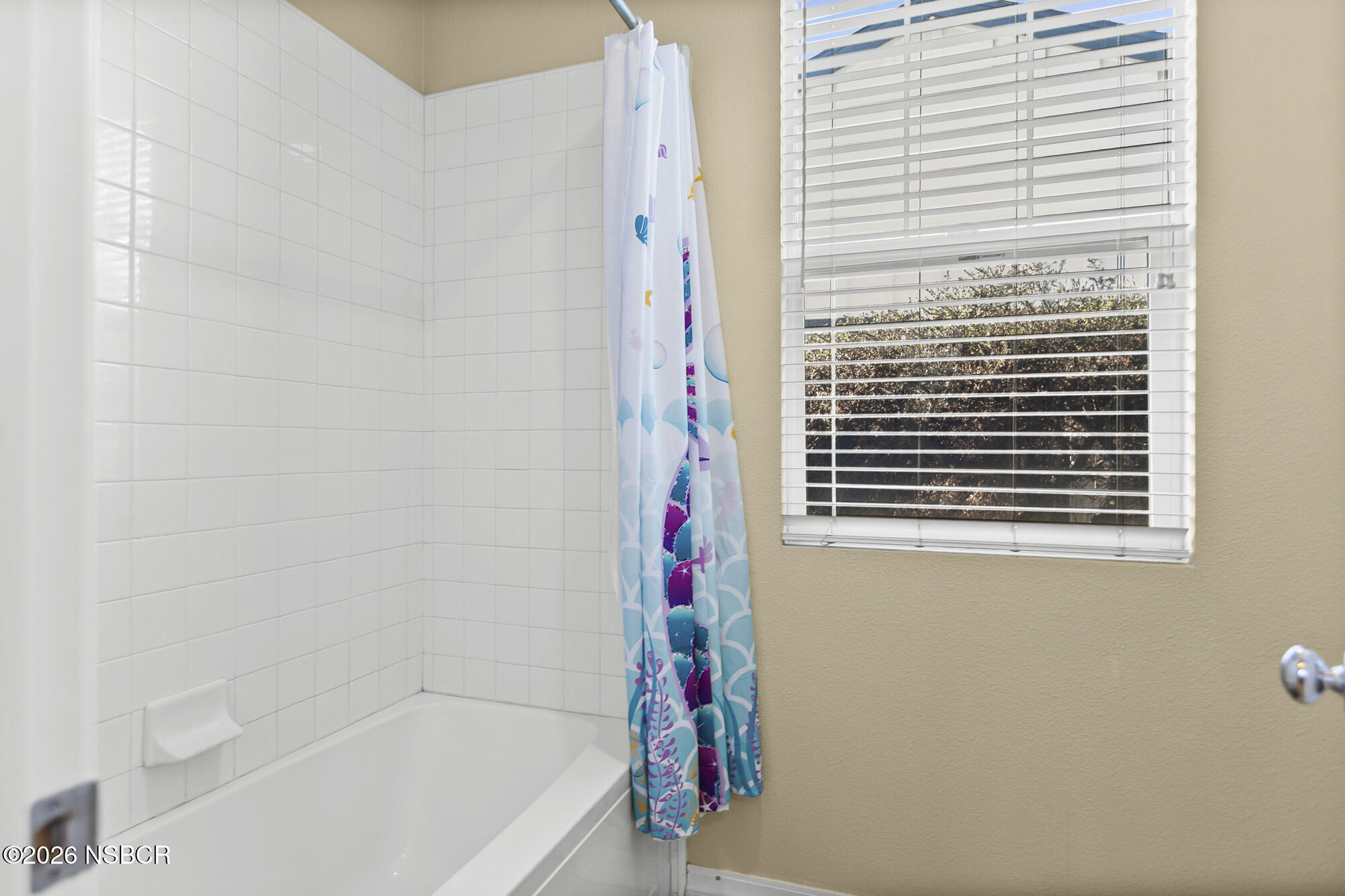 1557 Canyon Creek Road Santa Maria, CA 93455 - Photo 26 of 43 a bathroom with a bathtub and shower