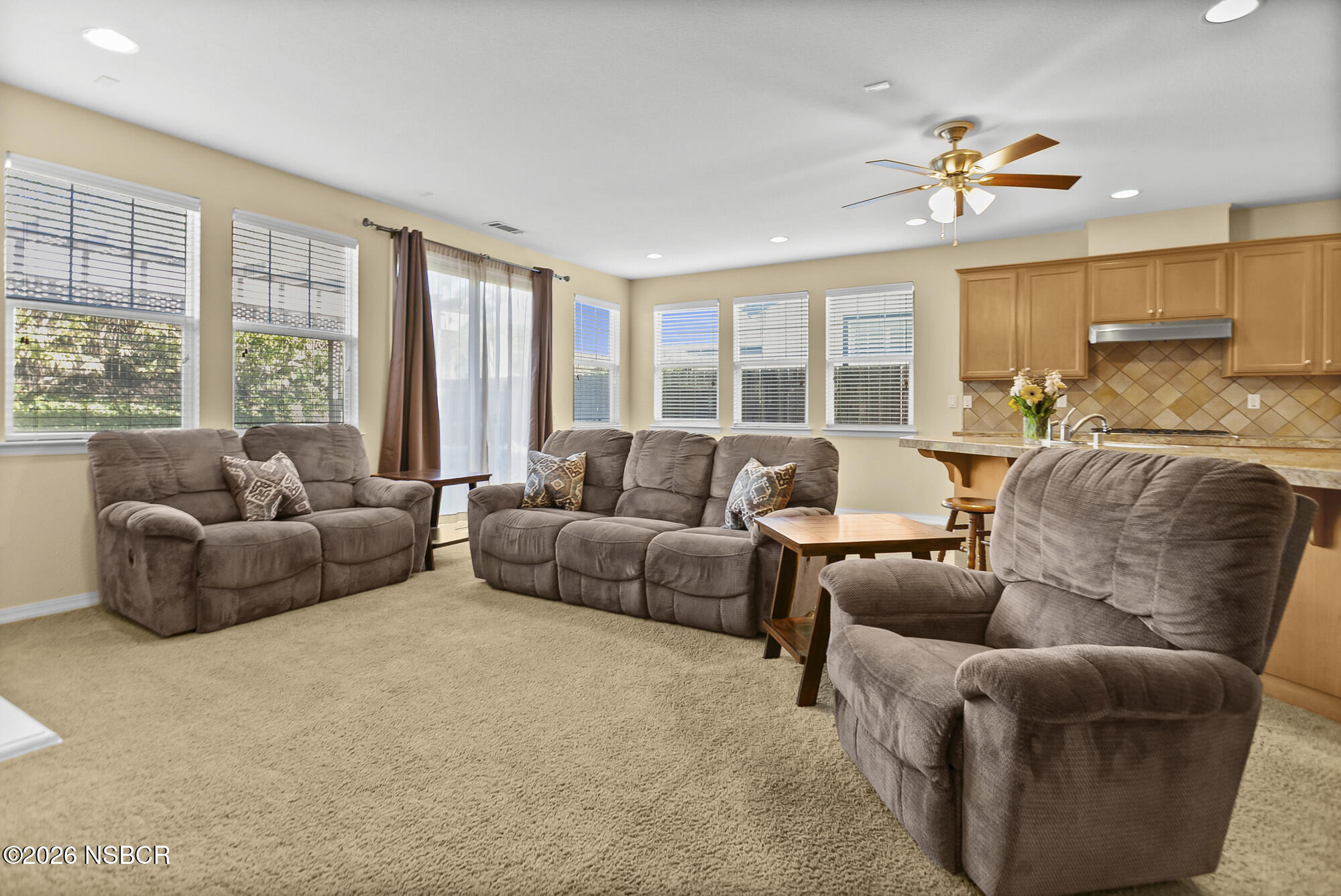 1557 Canyon Creek Road Santa Maria, CA 93455 - Photo 9 of 43 a living room with furniture and large windows