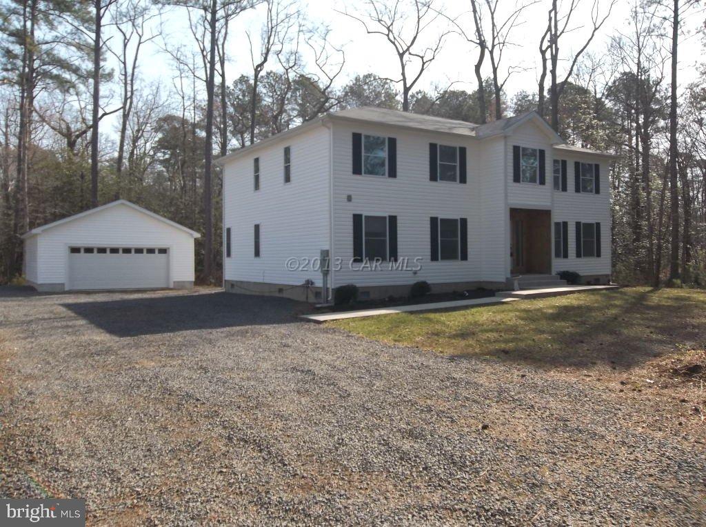 9409 Croppers Island Road Newark, MD 21841 - Photo 1 of 27 a view of a house with a yard