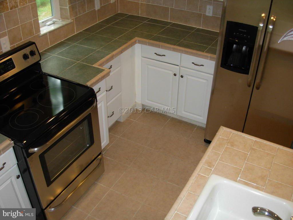 9409 Croppers Island Road Newark, MD 21841 - Photo 11 of 27 a view of an empty room