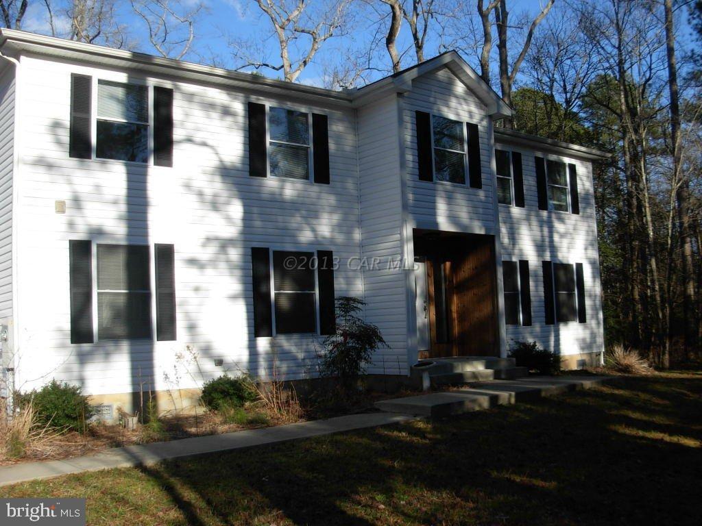 9409 Croppers Island Road Newark, MD 21841 - Photo 5 of 27 a front view of house with yard