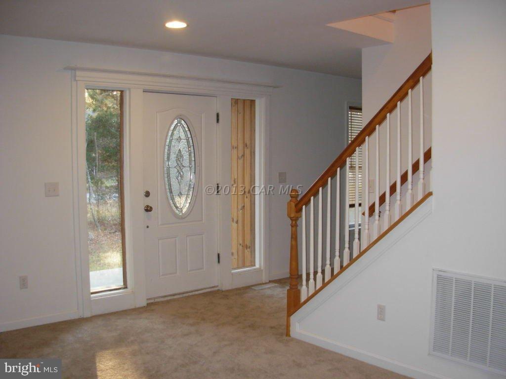 9409 Croppers Island Road Newark, MD 21841 - Photo 6 of 27 a view of an entryway with wooden floor
