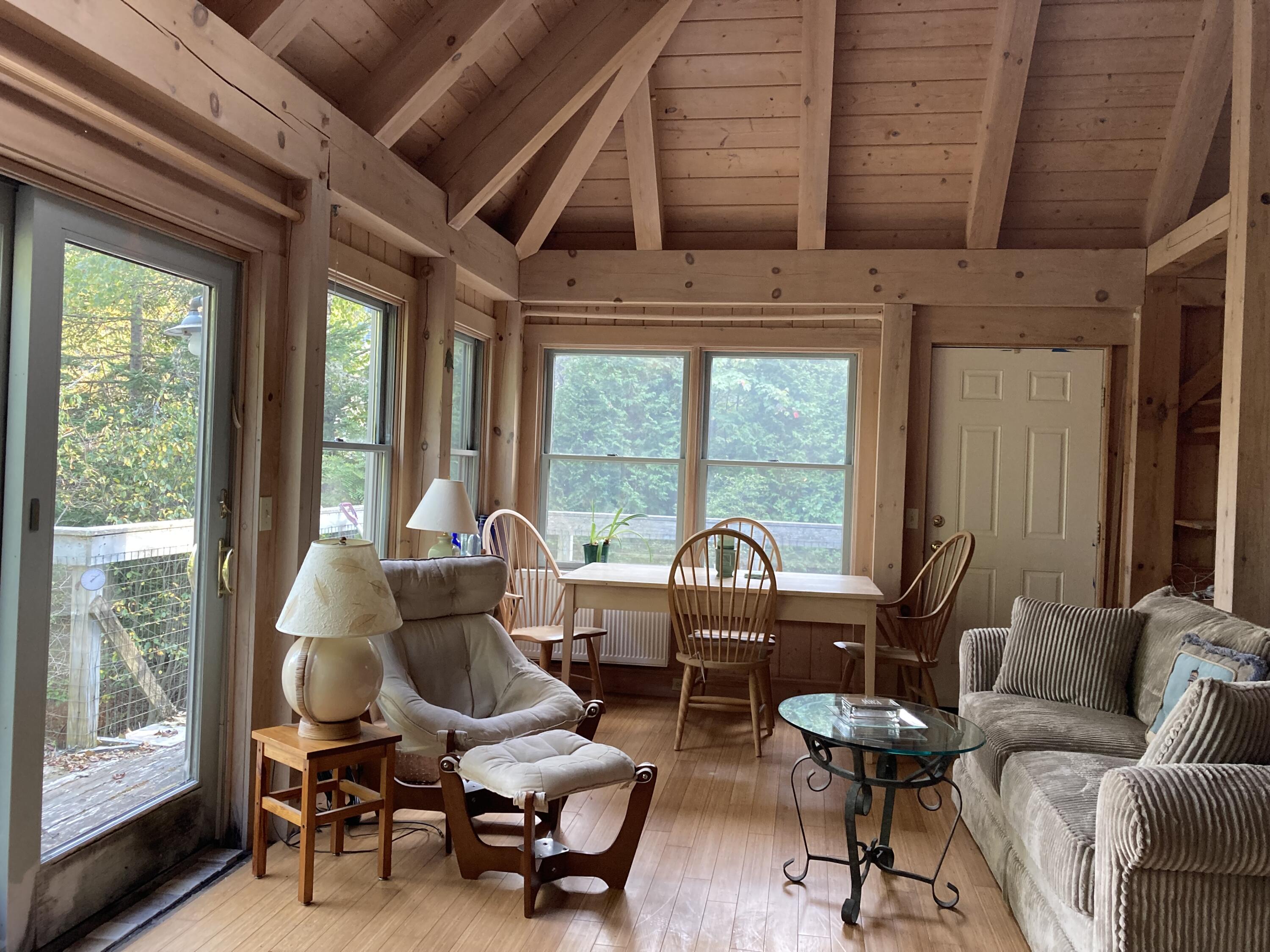 211 Goods Point Road Steuben, ME 04680 - Photo 5 of 20 Living room with slider to deck.