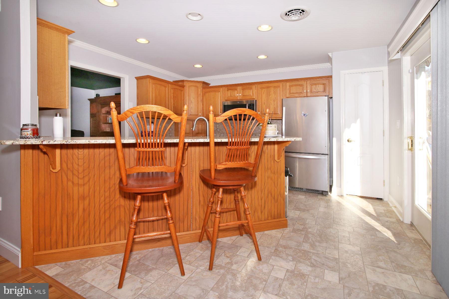 1023 Alden Way Lebanon, PA 17042 - Photo 11 of 74 a view of a kitchen with furniture and wooden floor