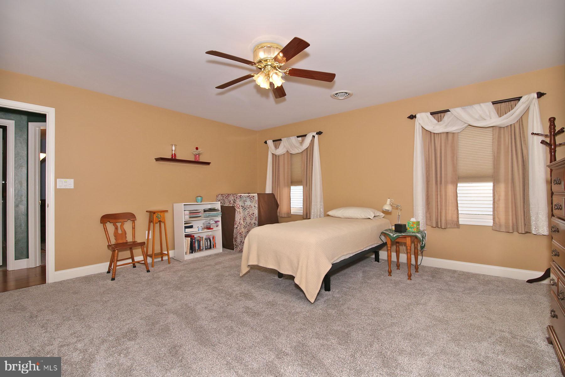 1023 Alden Way Lebanon, PA 17042 - Photo 27 of 74 a bedroom with a bed and a chair