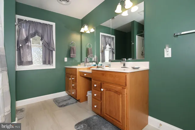 a view of a large building with a clock on the wall