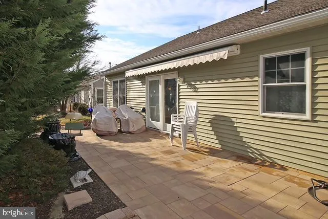 a view of a wooden deck and a lake view