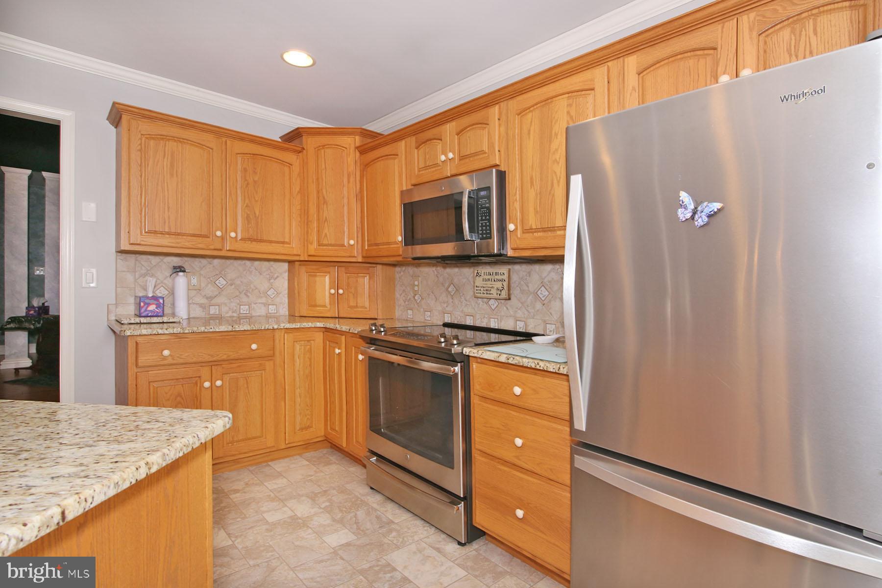 1023 Alden Way Lebanon, PA 17042 - Photo 7 of 74 a kitchen with stainless steel appliances granite countertop a refrigerator and a sink