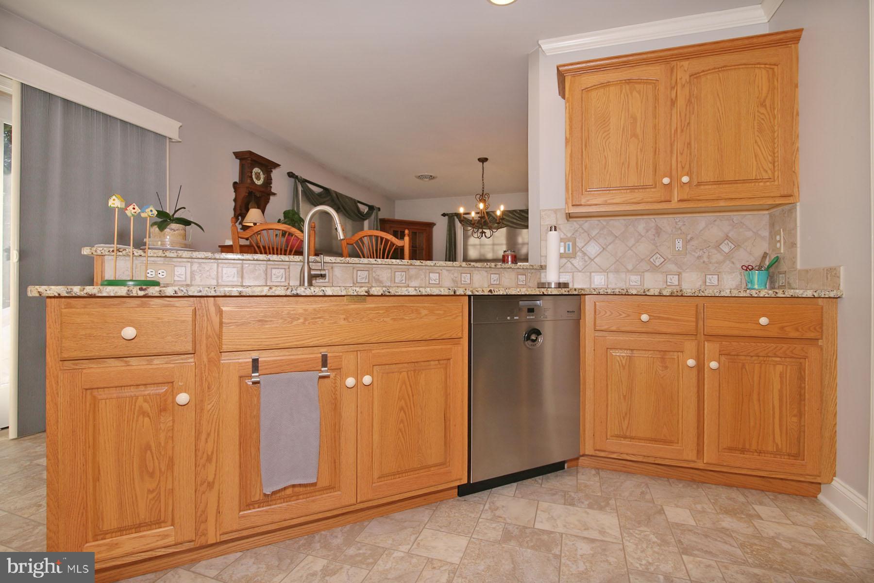 1023 Alden Way Lebanon, PA 17042 - Photo 10 of 74 a utility room with granite countertop cabinets washer and dryer