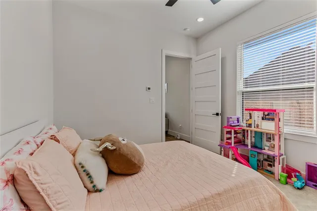 a bedroom with a bed and a closet