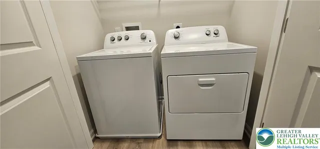 a utility room with dryer and washer