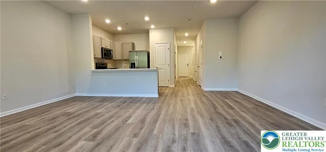 a view of kitchen with wooden floor