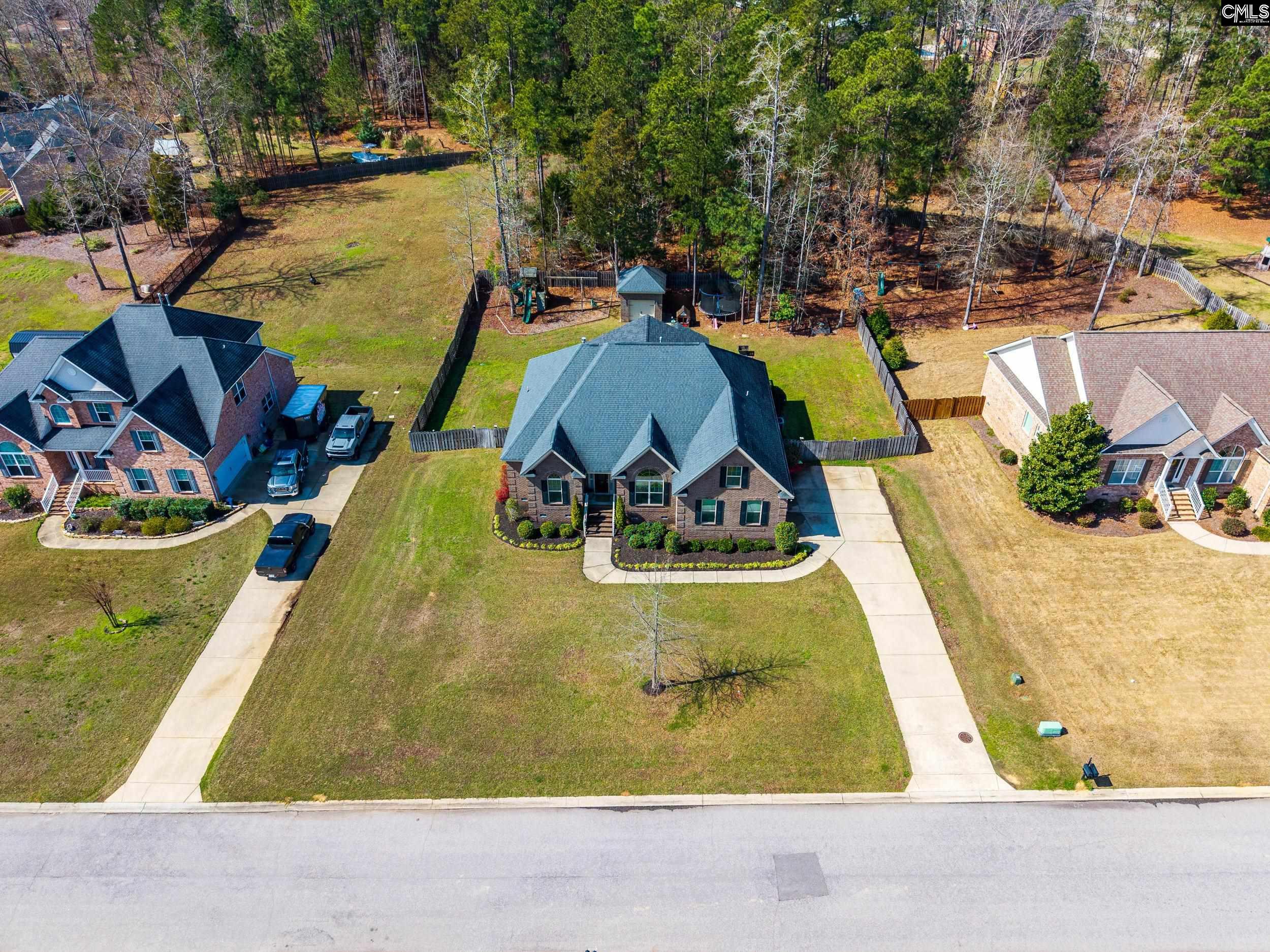 116 Renard Way Gilbert, SC 29054 - Photo 6 of 74 a view of a swimming pool with a patio