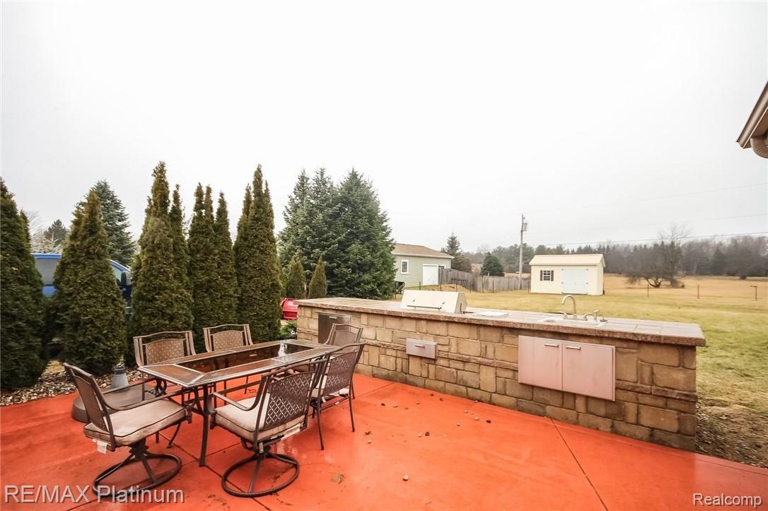 6621 Winans Lake Road Brighton, MI 48116 - Photo 29 of 36 047-Patio-3631767-medium.jpg