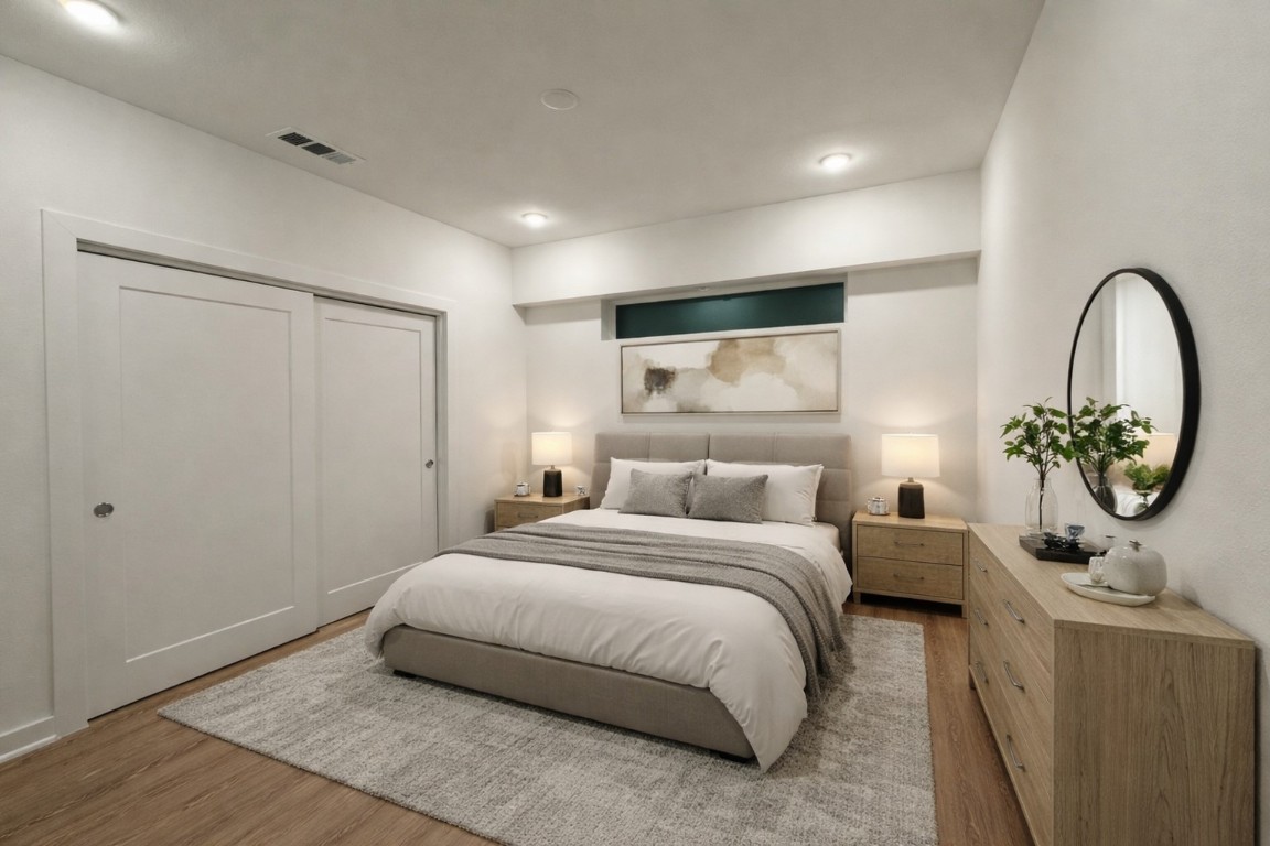 4802 South Congress Avenue, Unit 118 Austin, TX 78745 - Photo 8 of 20 a bedroom with a bed and a table