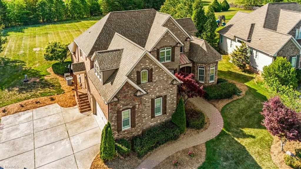 7787 Sutter Road Greensboro, NC 27455 - Photo 50 of 50 Ample parking and 2 care garage