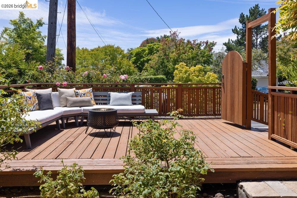 287 Purdue Avenue Kensington, CA 94708 - Photo 6 of 60 Expansive wood deck with perimeter railing and a tall wooden gate
