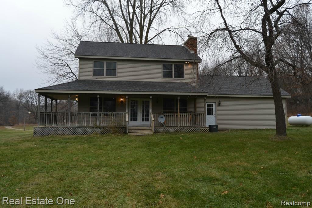 3935 Clyde Road Holly, MI 48442 - Photo 3 of 14 Brand new roof, newer siding...