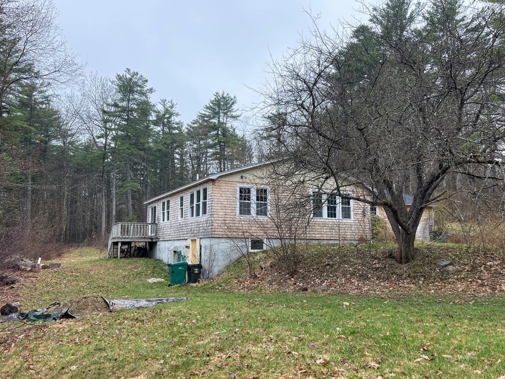 163 East Rindge Road Ashburnham, MA 01430 - Photo 3 of 42 a house that is sitting in the forest