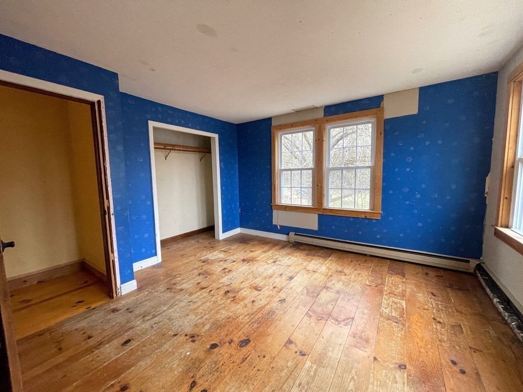 163 East Rindge Road Ashburnham, MA 01430 - Photo 32 of 42 a view of empty room with wooden floor and fan