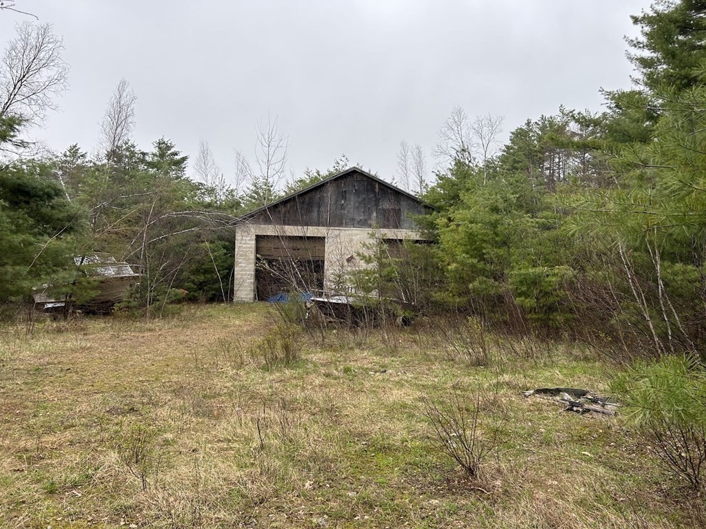 163 East Rindge Road Ashburnham, MA 01430 - Photo 39 of 42 a view of a wooden house with a yard