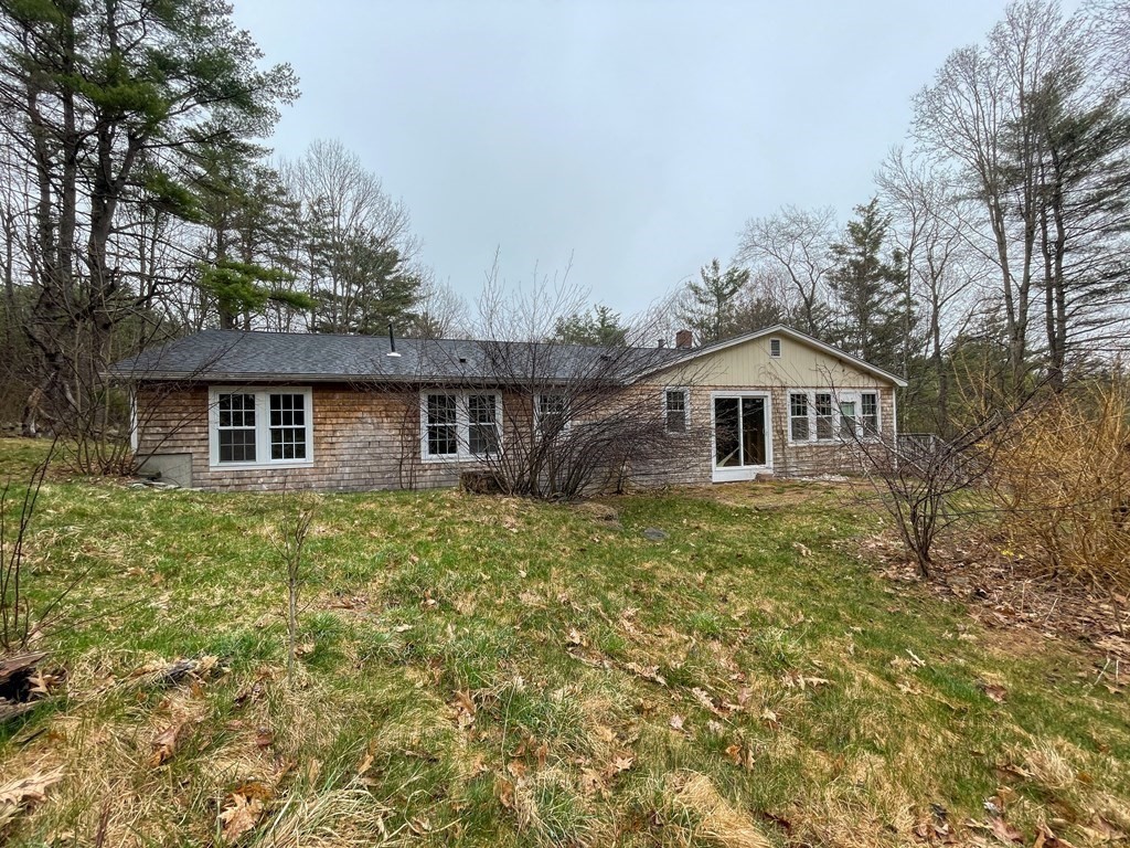163 East Rindge Road Ashburnham, MA 01430 - Photo 4 of 42 a front view of a house with garden