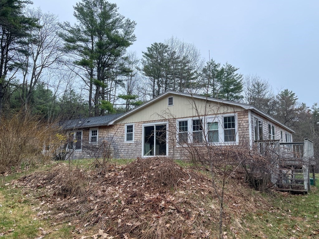 163 East Rindge Road Ashburnham, MA 01430 - Photo 5 of 42 a house with trees in the background