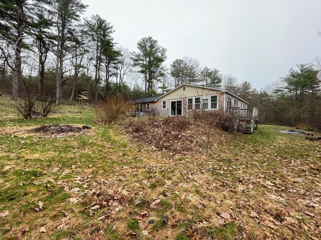 163 East Rindge Road Ashburnham, MA 01430 - Photo 6 of 42 a front view of a house with a yard