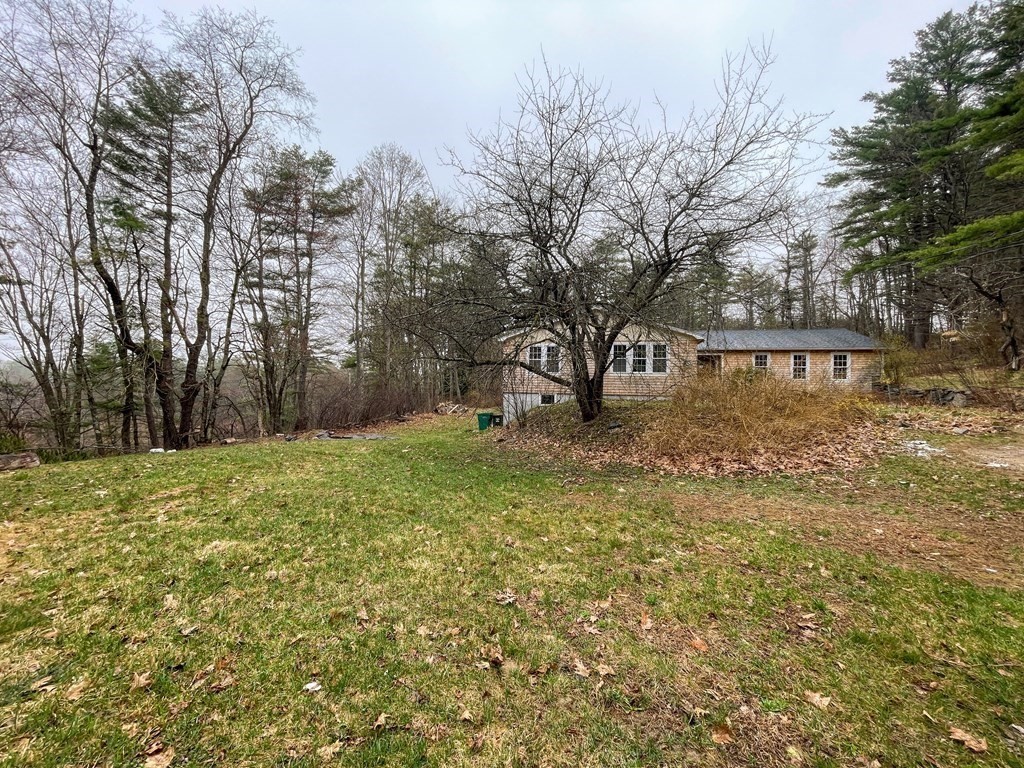 163 East Rindge Road Ashburnham, MA 01430 - Photo 10 of 42 a view of a yard with a house